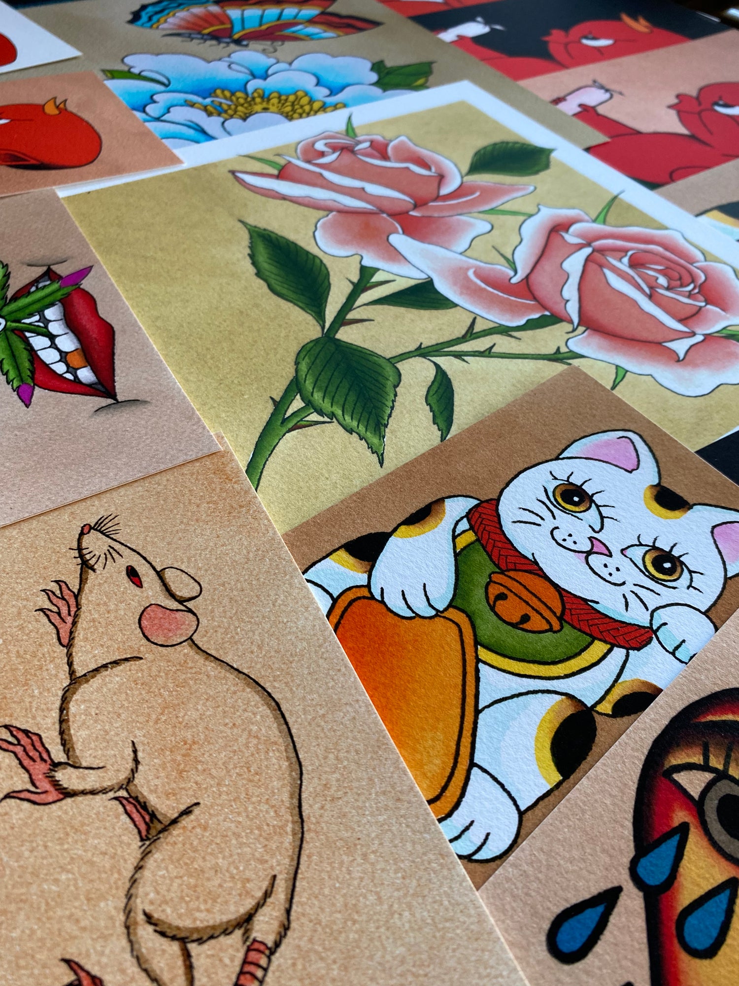 Collection of prints of original artwork by What A Spazz. Includes flowers, Japanese-inspired art, and a rat.